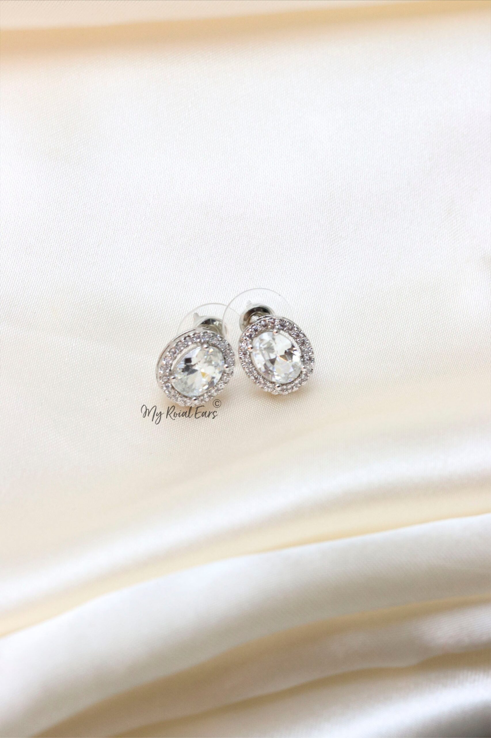 Q. Tida- charming sterling silver bridal earrings